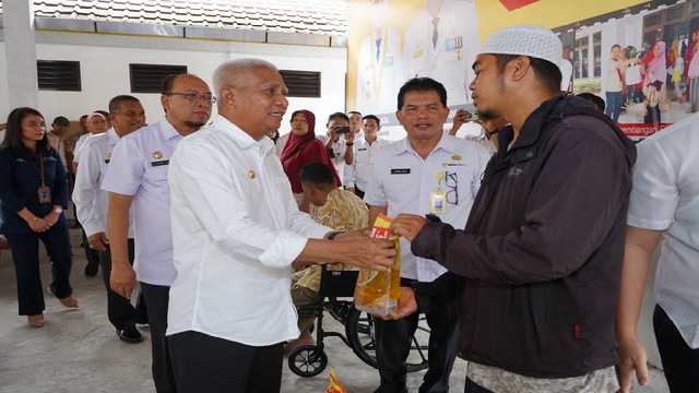 Read more about the article Bupati Asahan Serahkan Bansos dan Resmikan Posko Tagana