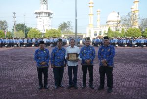 Read more about the article Upacara Hari Kesadaran Nasional Maret 2026: ASN Asahan Didorong Tingkatkan Disiplin dan Etos Kerja