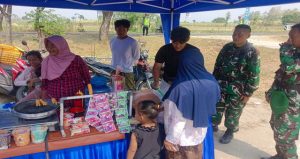 Read more about the article Seteguk Kesegaran Es Dawet Yogik: Cerita Manis Kemanunggalan TNI dan Warga di TMMD 129 Bojonegoro